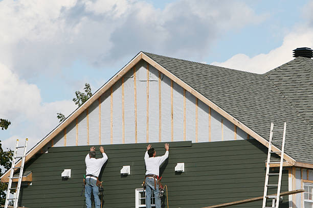 Professional Siding technician working in Monument, CO